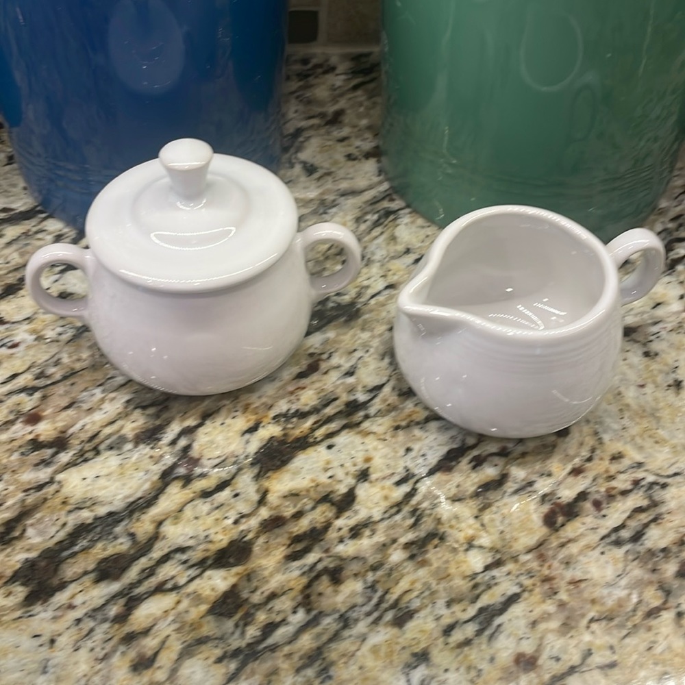 White Fiestaware sugar bowl w creamer